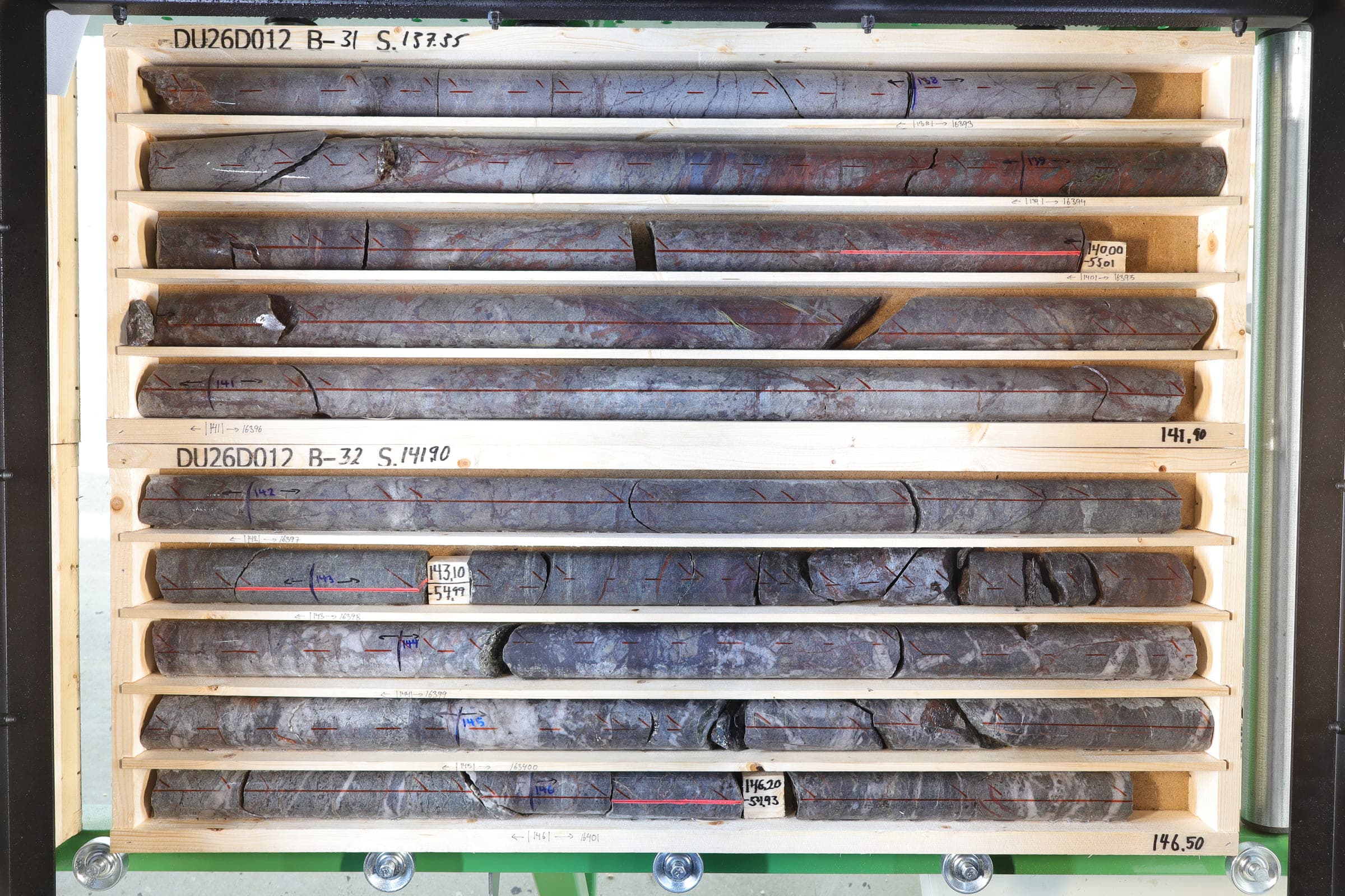 Drill core from hole DU26D012, 137.35–146.50 m, in core boxes